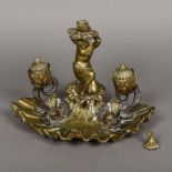 A 19th century Continental gilt bronze cast desk stand Worked with twin inkwells,