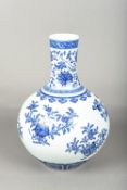 A Chinese blue and white porcelain vase The body decorated with fruiting and flowering sprays,