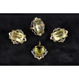 A suite of unmarked white and yellow gold citrine and diamond set jewellery Including: a ring,