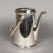 An International S Co of Canada Limited silver plated iced tea or lemonade pitcher Of spreading