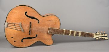 A 1950s Rolyford acoustic guitar Of typical form. 108 cm long.