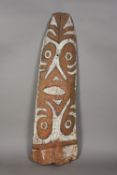 A Papa New Guinea tribal bark painting Painted on bark with stylised faces. 132 cm high.