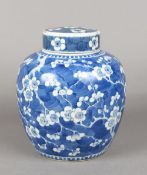A 19th century Chinese blue and white porcelain ginger jar and cover Decorated with prunus blossoms,