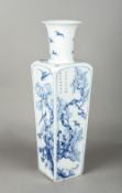 A Chinese Kangxi blue and white porcelain vase Of tapering square section decorated with birds