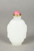 A Chinese carved mutton fat jade snuff bottle and stopper 9 cm high.