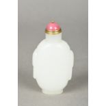 A Chinese carved mutton fat jade snuff bottle and stopper 9 cm high.