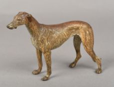 An Austrian cold painted bronze greyhound Naturalistically modelled, stamped Geschutzt. 15.