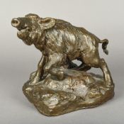 A 19th/20th century Continental bronze figure of a boar Naturalistically modelled before a tree