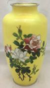 A Japanese white metal mounted cloisonne vase Worked with roses on a yellow ground. 21.5 cm high.