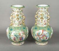 A pair of Chinese porcelain vases Each with gilt dragon applied neck decorated with insects amongst