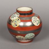 A Japanese pottery Art vase Of bulbous form, the banded decoration incorporating floral roundels,