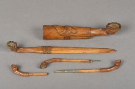 A 19th century Continental carved walnut or olive wood writing etui Worked as a bandaged horse's