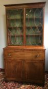 A George III mahogany secretaire bookcase The moulded rectangular top above the astragal glazed