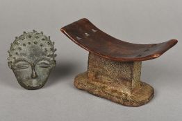 A South African carved wood headrest, together with an African bronze mask The former 19 cm wide.