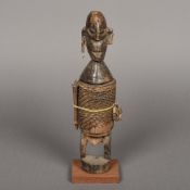 A late 19th/early 20th century African carved wood figural vessel, probably Dogon Tribe, Mali,