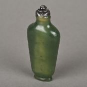 A Chinese spinach jade snuff bottle Of slender form with an unmarked white metal figural stopper.