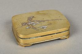 A Japanese inlaid brass box and cover Of rounded rectangular form, decorated with a river scene.