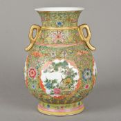 A Chinese porcelain twin handled vase Of baluster form,