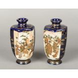 A pair of late 19th/early 20th century Japanese Satsuma pottery vases Of hexagonal section and