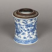 A Chinese blue and white porcelain brush pot Of waisted cylindrical form,