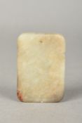 A Chinese carved jade pendant Of tablet form with incised decoration. 5.5 cm high.