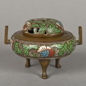 A Chinese champleve enamel decorated bronze censor Of squat twin handled form with pierced