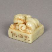 An 18th century Chinese carved jade seal Worked with a mythical beast,