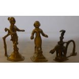 Three antique Indian brass Puja lamps Two of figural form,