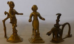 Three antique Indian brass Puja lamps Two of figural form,