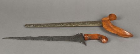 A 19th century South East Asian kris The wavy steel blade patterned,