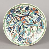 An Iznik pottery dish Typically worked
