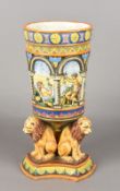 A Continental majolica vase The arcaded