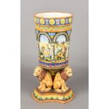 A Continental majolica vase The arcaded