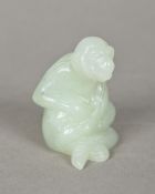 A Chinese carved jade model of a monkey