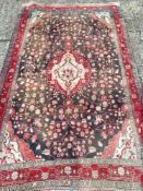 A Hamadan wool rug The midnight blue fi