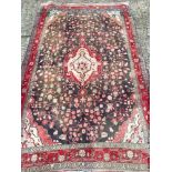 A Hamadan wool rug The midnight blue fi