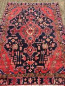 A Hamadan wool rug The midnight blue fi