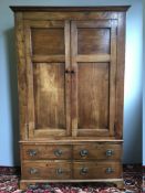 A 19th century French fruitwood armoire