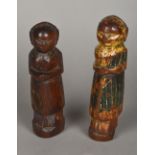 A pair of antique carved wood and polych