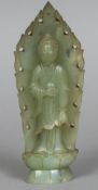 A Chinese carved green jade figure