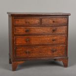 A 19th century mahogany miniature chest