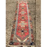 A Caucasian wool runner The wine red fi
