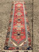 A Caucasian wool runner The wine red fi