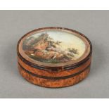 A 19th century burrwood and tortoiseshell circular box and cover Inset with a well painted