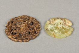 Two carved and pierced jade roundels