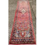 A Hamadan wool runner The wine red fie