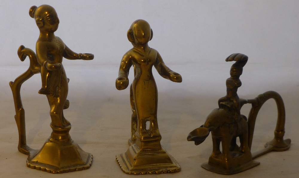 Three antique Indian brass Puja lamps