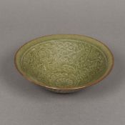 A Chinese porcelain spiral moulded bowl The interior worked with figural vignettes and floral