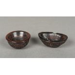 Two Chinese carved horn bowls One worke