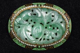 An enamel decorated and seed pearl mount